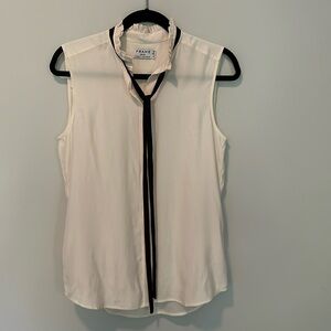 Frame white tank with black tie detail around collar. Worn only once!